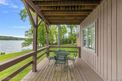 WONDERFUL RANCH HOME WITH LL WALK-OUT IS NESTLED AMONG THE TREES on Lakelands Golf and Country Club in Michigan - for sale on GolfHomes.com, golf home, golf lot