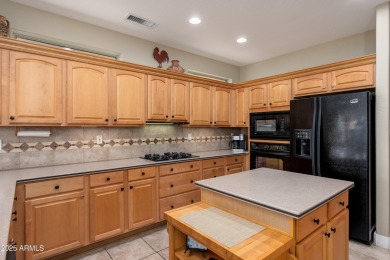 Experience the perfect blend of style, comfort, and location to on Sun City Grand Golf Couse and Club in Arizona - for sale on GolfHomes.com, golf home, golf lot