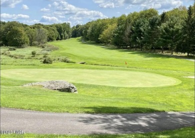 Nestled in The Hideout, a secure gated community, this wooded on The Hideout Golf in Pennsylvania - for sale on GolfHomes.com, golf home, golf lot