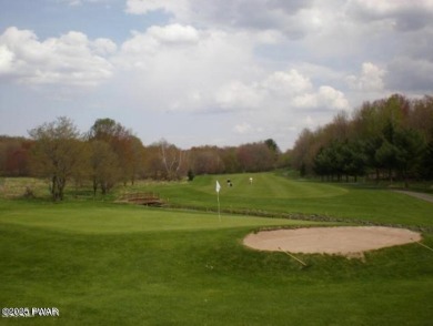 Nestled in The Hideout, a secure gated community, this wooded on The Hideout Golf in Pennsylvania - for sale on GolfHomes.com, golf home, golf lot