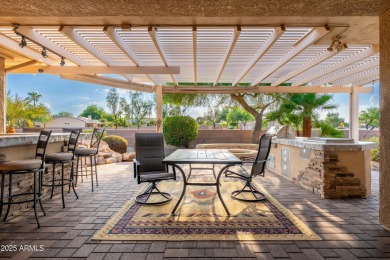 Experience the perfect blend of style, comfort, and location to on Sun City Grand Golf Couse and Club in Arizona - for sale on GolfHomes.com, golf home, golf lot