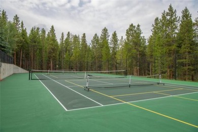 Nestled in a mature forest of pines and aspens, overlooking open on Keystone Ranch Golf Course in Colorado - for sale on GolfHomes.com, golf home, golf lot