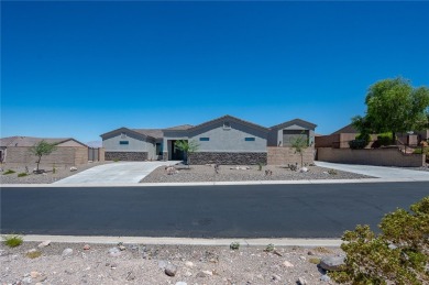 3259 Esmerelda Drive is a single-family residence that presents on Laughlin Ranch Golf Club in Arizona - for sale on GolfHomes.com, golf home, golf lot