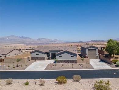 3259 Esmerelda Drive is a single-family residence that presents on Laughlin Ranch Golf Club in Arizona - for sale on GolfHomes.com, golf home, golf lot