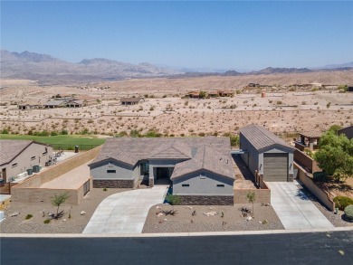 3259 Esmerelda Drive is a single-family residence that presents on Laughlin Ranch Golf Club in Arizona - for sale on GolfHomes.com, golf home, golf lot