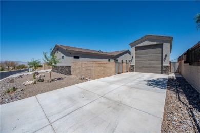 3259 Esmerelda Drive is a single-family residence that presents on Laughlin Ranch Golf Club in Arizona - for sale on GolfHomes.com, golf home, golf lot