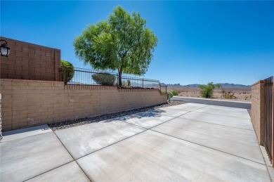 3259 Esmerelda Drive is a single-family residence that presents on Laughlin Ranch Golf Club in Arizona - for sale on GolfHomes.com, golf home, golf lot