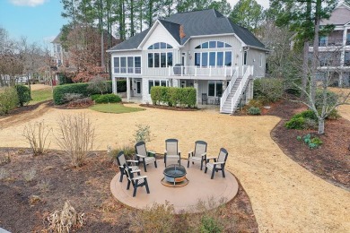 A true masterpiece with hardi-board and stone exterior, an on The Patriot Golf Club At Grand Harbor in South Carolina - for sale on GolfHomes.com, golf home, golf lot