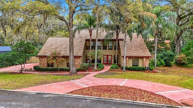 Hidden Hills is a gated community ideally positioned between the on Hidden Hills Country Club in Florida - for sale on GolfHomes.com, golf home, golf lot