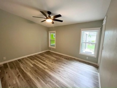 Beautifully renovated 2BD/2BA stucco home perfectly blends on Del Tura Golf and Country Club in Florida - for sale on GolfHomes.com, golf home, golf lot