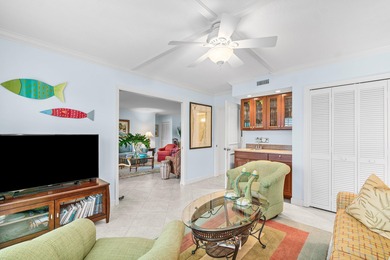 Wake up to tranquil lake and golf course views in this welcoming on Quail Ridge Golf Course and Country Club in Florida - for sale on GolfHomes.com, golf home, golf lot