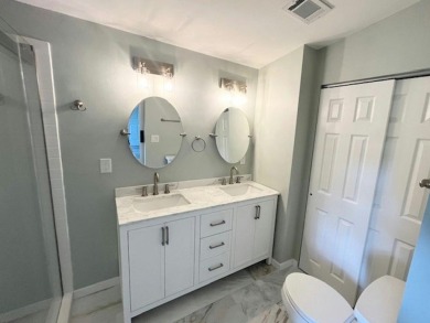 Beautifully renovated 2BD/2BA stucco home perfectly blends on Del Tura Golf and Country Club in Florida - for sale on GolfHomes.com, golf home, golf lot