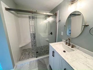 Beautifully renovated 2BD/2BA stucco home perfectly blends on Del Tura Golf and Country Club in Florida - for sale on GolfHomes.com, golf home, golf lot