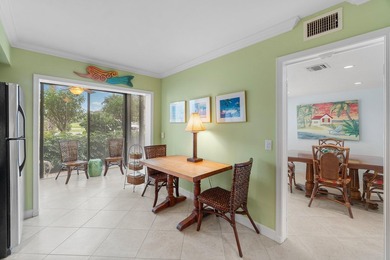 Wake up to tranquil lake and golf course views in this welcoming on Quail Ridge Golf Course and Country Club in Florida - for sale on GolfHomes.com, golf home, golf lot