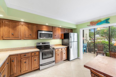 Wake up to tranquil lake and golf course views in this welcoming on Quail Ridge Golf Course and Country Club in Florida - for sale on GolfHomes.com, golf home, golf lot