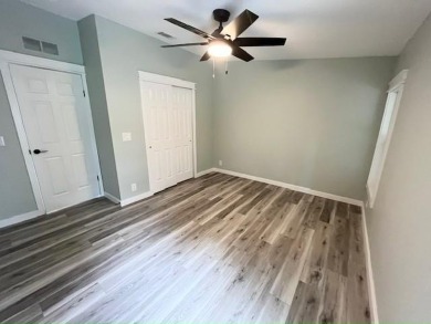 Beautifully renovated 2BD/2BA stucco home perfectly blends on Del Tura Golf and Country Club in Florida - for sale on GolfHomes.com, golf home, golf lot