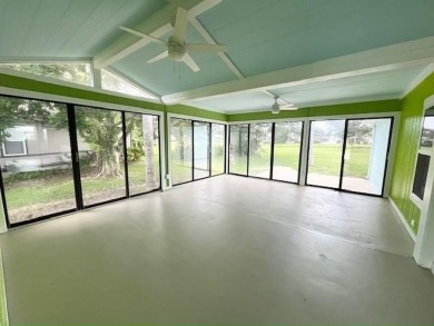 Beautifully renovated 2BD/2BA stucco home perfectly blends on Del Tura Golf and Country Club in Florida - for sale on GolfHomes.com, golf home, golf lot