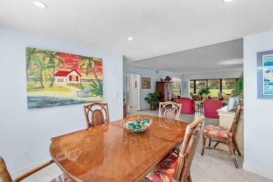 Wake up to tranquil lake and golf course views in this welcoming on Quail Ridge Golf Course and Country Club in Florida - for sale on GolfHomes.com, golf home, golf lot