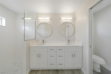 This nearly completed WATERFRONT TRIPLEX in Rotonda West, FL, is on Rotonda Golf and Country Club The Palms Course in Florida - for sale on GolfHomes.com, golf home, golf lot