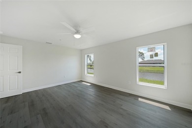 This nearly completed WATERFRONT TRIPLEX in Rotonda West, FL, is on Rotonda Golf and Country Club The Palms Course in Florida - for sale on GolfHomes.com, golf home, golf lot