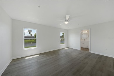 This nearly completed WATERFRONT TRIPLEX in Rotonda West, FL, is on Rotonda Golf and Country Club The Palms Course in Florida - for sale on GolfHomes.com, golf home, golf lot
