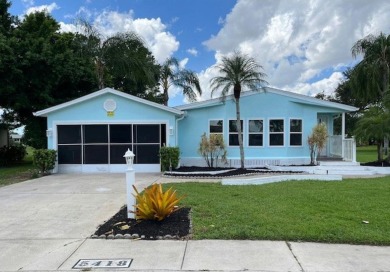 Beautifully renovated 2BD/2BA stucco home perfectly blends on Del Tura Golf and Country Club in Florida - for sale on GolfHomes.com, golf home, golf lot