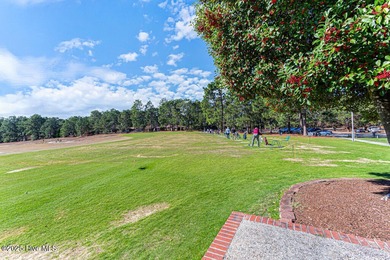 Lovely brick condominium in great location close to downtown on The National Golf Club in North Carolina - for sale on GolfHomes.com, golf home, golf lot