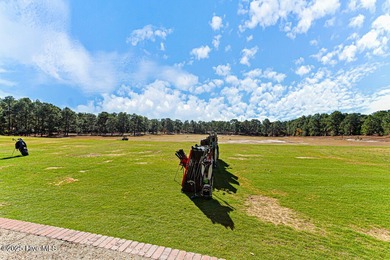 Lovely brick condominium in great location close to downtown on The National Golf Club in North Carolina - for sale on GolfHomes.com, golf home, golf lot