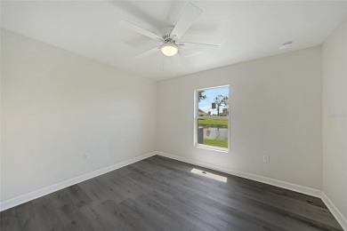 This nearly completed WATERFRONT TRIPLEX in Rotonda West, FL, is on Rotonda Golf and Country Club The Palms Course in Florida - for sale on GolfHomes.com, golf home, golf lot