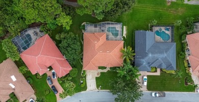 2021 Barrel Tile Roof, 2023 a/c, 2022 water heater, Accordion on St. Lucie Trail Golf Club in Florida - for sale on GolfHomes.com, golf home, golf lot