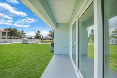 This nearly completed WATERFRONT TRIPLEX in Rotonda West, FL, is on Rotonda Golf and Country Club The Palms Course in Florida - for sale on GolfHomes.com, golf home, golf lot