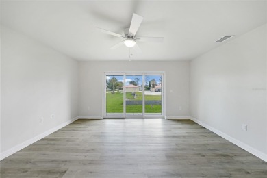 This nearly completed WATERFRONT TRIPLEX in Rotonda West, FL, is on Rotonda Golf and Country Club The Palms Course in Florida - for sale on GolfHomes.com, golf home, golf lot