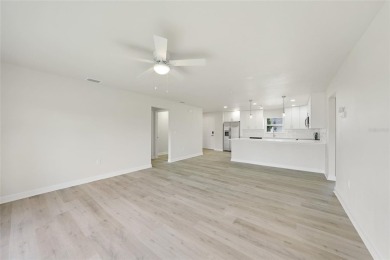This nearly completed WATERFRONT TRIPLEX in Rotonda West, FL, is on Rotonda Golf and Country Club The Palms Course in Florida - for sale on GolfHomes.com, golf home, golf lot