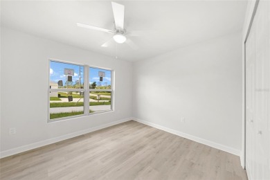This nearly completed WATERFRONT TRIPLEX in Rotonda West, FL, is on Rotonda Golf and Country Club The Palms Course in Florida - for sale on GolfHomes.com, golf home, golf lot