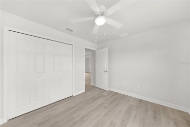 This nearly completed WATERFRONT TRIPLEX in Rotonda West, FL, is on Rotonda Golf and Country Club The Palms Course in Florida - for sale on GolfHomes.com, golf home, golf lot