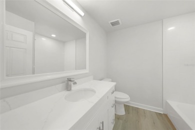 This nearly completed WATERFRONT TRIPLEX in Rotonda West, FL, is on Rotonda Golf and Country Club The Palms Course in Florida - for sale on GolfHomes.com, golf home, golf lot