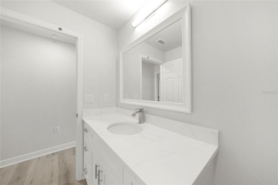 This nearly completed WATERFRONT TRIPLEX in Rotonda West, FL, is on Rotonda Golf and Country Club The Palms Course in Florida - for sale on GolfHomes.com, golf home, golf lot