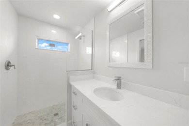 This nearly completed WATERFRONT TRIPLEX in Rotonda West, FL, is on Rotonda Golf and Country Club The Palms Course in Florida - for sale on GolfHomes.com, golf home, golf lot