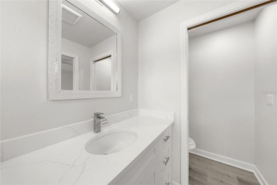 This nearly completed WATERFRONT TRIPLEX in Rotonda West, FL, is on Rotonda Golf and Country Club The Palms Course in Florida - for sale on GolfHomes.com, golf home, golf lot