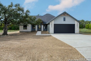 Discover the charm of this beautifully designed one-story home on Vaaler Creek Golf Club in Texas - for sale on GolfHomes.com, golf home, golf lot