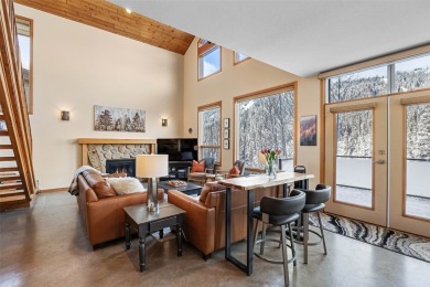 This exceptional level-entry, three-story chalet, nestled along on  in  - for sale on GolfHomes.com, golf home, golf lot