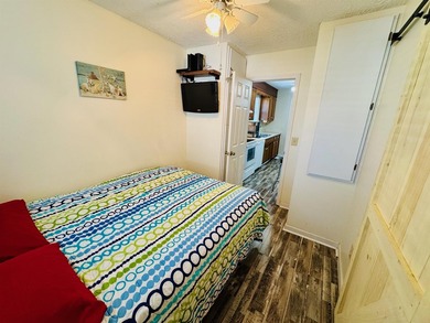 EXCELLENT PRICE ON THIS WELL CONSTRUCTED STICKBUILT, BEACH HOUSE on Prestwick Country Club in South Carolina - for sale on GolfHomes.com, golf home, golf lot