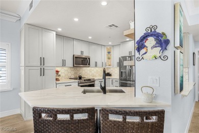 Condo and Boat Dock Available! Experience luxury coastal living on Fort Myers Beach and Golf Club in Florida - for sale on GolfHomes.com, golf home, golf lot