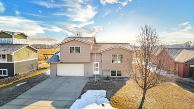 Start your next chapter in this move-in-ready 3 bed 2 bath split on Spencer Golf and Country Club in Iowa - for sale on GolfHomes.com, golf home, golf lot
