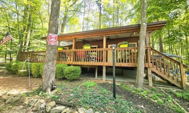 Welcome home to this wonderful 2 bedroom, 1 bath cabin in on Hide-A-Way Hills Golf Club in Ohio - for sale on GolfHomes.com, golf home, golf lot