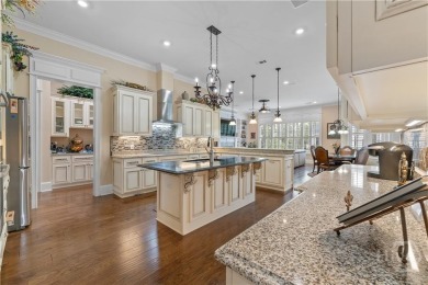 A custom masterpiece of luxury & craftmanship in the highly on Savannah Quarters Country Club in Georgia - for sale on GolfHomes.com, golf home, golf lot