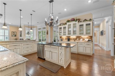 A custom masterpiece of luxury & craftmanship in the highly on Savannah Quarters Country Club in Georgia - for sale on GolfHomes.com, golf home, golf lot