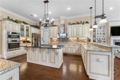 A custom masterpiece of luxury & craftmanship in the highly on Savannah Quarters Country Club in Georgia - for sale on GolfHomes.com, golf home, golf lot