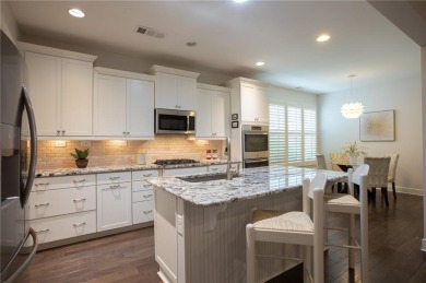 Enjoy the perfect balance of comfort and connection in this on Lanier Island Legacy Golf Couorse in Georgia - for sale on GolfHomes.com, golf home, golf lot