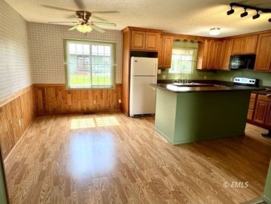 Location, location, location! This single-level home sits on a on Miles City Town and Country Club in Montana - for sale on GolfHomes.com, golf home, golf lot